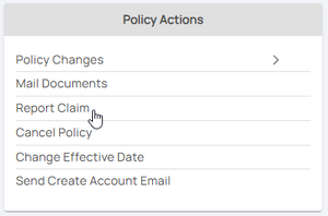 A large clock tower and other buildings line a great river.